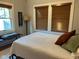 Inviting bedroom with a comfortable bed, bright windows, and simple decor at 5786 N Delaware St, Indianapolis, IN 46220