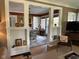 Open-concept dining room with a large dining table and a view into other rooms at 5786 N Delaware St, Indianapolis, IN 46220