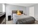 This bedroom offers a serene space with a cozy bed and stylish nightstand, creating a relaxing retreat at 5812 Flat Hill Dr, Indianapolis, IN 46239