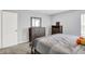 This bedroom features a stylish dresser with a mirror, offering a practical and elegant storage solution at 5812 Flat Hill Dr, Indianapolis, IN 46239