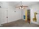 Bedroom with plush carpet and ceiling fan at 590 W Washington St, Martinsville, IN 46151