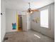 Neutral bedroom with plush carpet and ceiling fan at 590 W Washington St, Martinsville, IN 46151