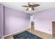 Hardwood bedroom space is well lit and features a walk-in closet and neutral paint at 6259 Teacup Dr, Indianapolis, IN 46235