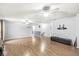 Large bonus room with hardwood floors, ceiling fans, and plenty of space for activities at 6259 Teacup Dr, Indianapolis, IN 46235