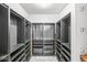 Walk-in closet with custom shelving and ample storage space for clothes and accessories at 6259 Teacup Dr, Indianapolis, IN 46235