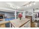 Open kitchen layout with a view into the Gathering room and a unique center island at 6259 Teacup Dr, Indianapolis, IN 46235