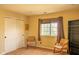 Bedroom features neutral walls, natural light, and a closet for storage at 6585 Dunsdin Dr, Plainfield, IN 46168