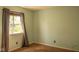 Neutral bedroom with natural light from the window and carpeted floors at 6585 Dunsdin Dr, Plainfield, IN 46168