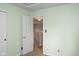 Hallway featuring a doorway to an adjoining room at 6585 Dunsdin Dr, Plainfield, IN 46168
