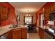 Spacious kitchen featuring wooden cabinets, modern appliances, and a dining area perfect for Gathering meals at 6585 Dunsdin Dr, Plainfield, IN 46168