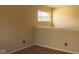 Living room features neutral walls, natural light, and outlets for convenience at 6585 Dunsdin Dr, Plainfield, IN 46168