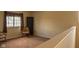 Cozy living room with a window for natural light and comfortable seating at 6585 Dunsdin Dr, Plainfield, IN 46168