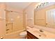 Traditional bathroom with a combined shower and tub, single sink vanity, and a medicine cabinet at 6965 Steinmeier W Dr, Indianapolis, IN 46220