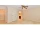 Neutral bedroom with carpet flooring adjacent to a full bathroom at 6965 Steinmeier W Dr, Indianapolis, IN 46220
