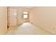 Light-filled bedroom with carpet, window and blinds, and a convenient electrical outlet at 6965 Steinmeier W Dr, Indianapolis, IN 46220