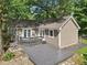 Inviting backyard deck and patio with an outdoor space that's perfect for entertaining at 7141 E Pleasant Run Pkwy S Dr, Indianapolis, IN 46219