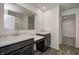 Elegant bathroom with double vanity sinks, granite countertops, and a glass-enclosed shower at 7501 Firecrest Ln, Camby, IN 46113