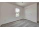 Carpeted bedroom features a closet, a window, and neutral walls at 7501 Firecrest Ln, Camby, IN 46113