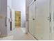 Accessible bathroom featuring a shower, handrails, and neutral color scheme at 786 Woodview North Dr, Carmel, IN 46032