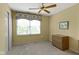 Bedroom with neutral walls, carpet, closet, and natural light flooding through the window at 786 Woodview North Dr, Carmel, IN 46032