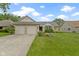 Charming single-story brick home with a well-manicured lawn, a two-car garage, and inviting curb appeal at 786 Woodview North Dr, Carmel, IN 46032