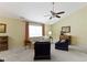 Spacious living room showcases neutral colors, comfortable seating, and a large window providing ample natural light at 786 Woodview North Dr, Carmel, IN 46032