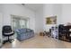 Open living room with sliding glass doors, wood floors, and seating area at 8038 Midlothian Way, Indianapolis, IN 46214