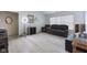 Comfortable living room featuring modern flooring and cozy seating arrangement at 8038 Midlothian Way, Indianapolis, IN 46214