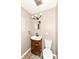 Cozy bathroom with wooden vanity, modern black faucet, and neutral color scheme at 823 Rustic Rd, Anderson, IN 46013