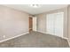 Comfortable bedroom with closet and neutral color palette at 823 Rustic Rd, Anderson, IN 46013