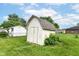 Backyard shed in a large, grassy back yard; great for storage and hobbies at 823 Rustic Rd, Anderson, IN 46013