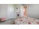 This is a bright, clean bedroom with floral bedding, neutral walls, and modern storage, creating a cozy and inviting space at 853 Woodbridge Way, Lebanon, IN 46052