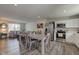 Open concept living space with kitchen, dining area, and a comfortable living room with lots of natural light at 853 Woodbridge Way, Lebanon, IN 46052