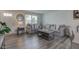 Comfortable living room with stylish decor, plush seating, and ample natural light, creating a relaxing and inviting space at 853 Woodbridge Way, Lebanon, IN 46052