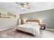 Bedroom featuring decor shelves, wood furnishings, neutral walls and carpeting, and ceiling fan at 8547 Winton Pl, Pendleton, IN 46064