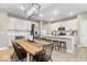 Bright kitchen and dining area with granite countertops and stainless-steel appliances at 8547 Winton Pl, Pendleton, IN 46064