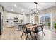 Eat-in kitchen with granite counters, island seating and stainless appliances is a chef's dream at 8547 Winton Pl, Pendleton, IN 46064