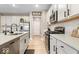 Well-equipped kitchen with stainless appliances, granite counters, subway tile backsplash at 8547 Winton Pl, Pendleton, IN 46064