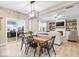 The open floorplan features dining, living, and kitchen areas and a walk out to the back yard at 8547 Winton Pl, Pendleton, IN 46064