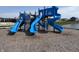 Large, modern playground with multiple blue slides, climbing structures and engineered wood fiber at 8547 Winton Pl, Pendleton, IN 46064