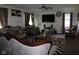 Elegant living room featuring ornate furniture, plush seating, and natural light at 9068 Thames Dr, Avon, IN 46123