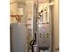 A utility room featuring a hot water heater and HVAC system, ensuring home comfort and efficiency at 9068 Thames Dr, Avon, IN 46123