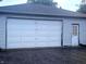 Exterior shot of detached garage with door to the side at 9470 N Old Port Royal, Martinsville, IN 46151