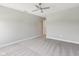 Spacious bedroom featuring neutral walls, carpet flooring, and a ceiling fan at 9498 Tobin Cir, Avon, IN 46123