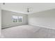 Bedroom featuring neutral walls, carpet flooring, ceiling fan, and windows bringing in natural light at 9498 Tobin Cir, Avon, IN 46123