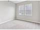Bedroom featuring neutral walls, carpet flooring, and two windows bringing in natural light at 9498 Tobin Cir, Avon, IN 46123