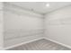 Walk-in closet with wire shelving and carpet flooring for ample storage space at 9498 Tobin Cir, Avon, IN 46123