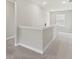 Hallway with neutral walls, carpet flooring, white trim, and access to other rooms at 9498 Tobin Cir, Avon, IN 46123