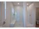 Bathroom with a tiled walk-in shower, bench, and glass door at 9728 Junction, Fishers, IN 46037