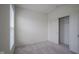 Bedroom features neutral carpet, a window with blinds, and a closet with a sliding door at 9728 Junction, Fishers, IN 46037